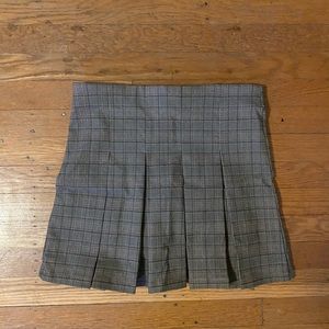 Plaid pleated mini skirt. Never worn!